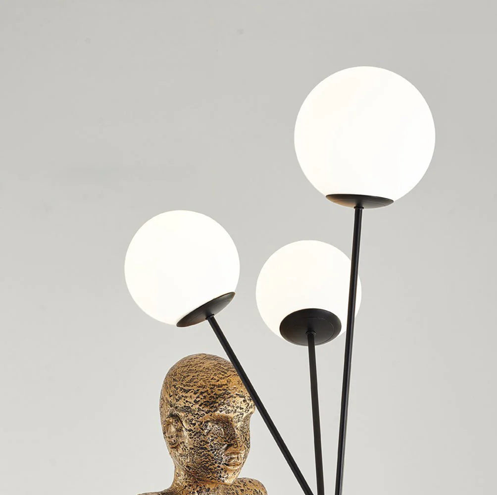 Close-up of the three "balloon" lampshades of Amelia Sculpture Floor Lamp.