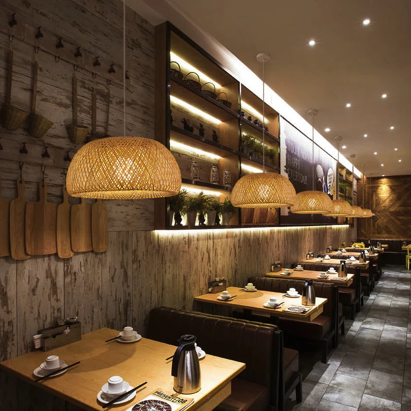 In a famous restaurant, a Bamboo Basket Pendant is hung on each table.