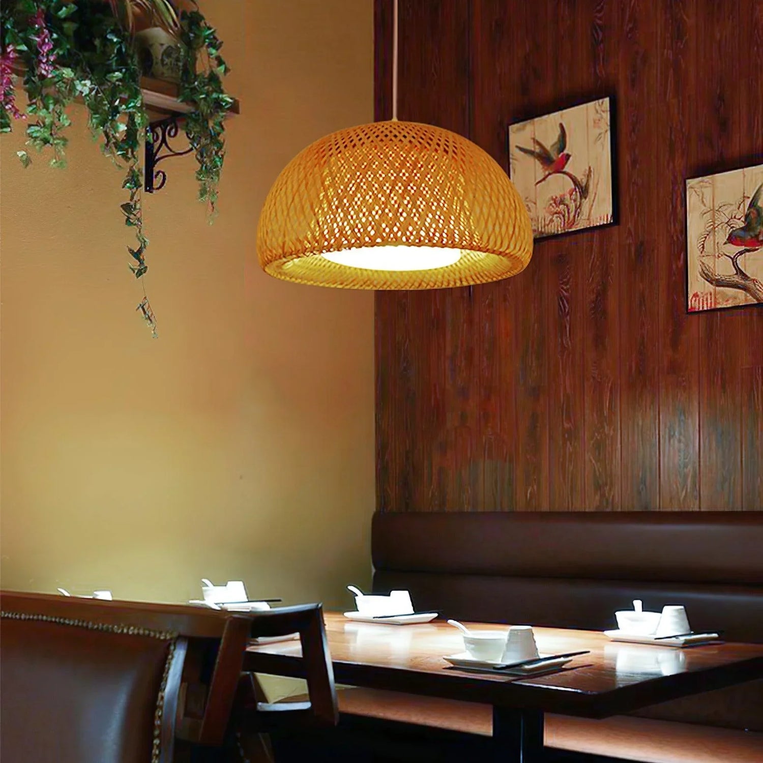 The hand-woven Bamboo Basket Pendant Lamp is perfect for hanging in the dining room.