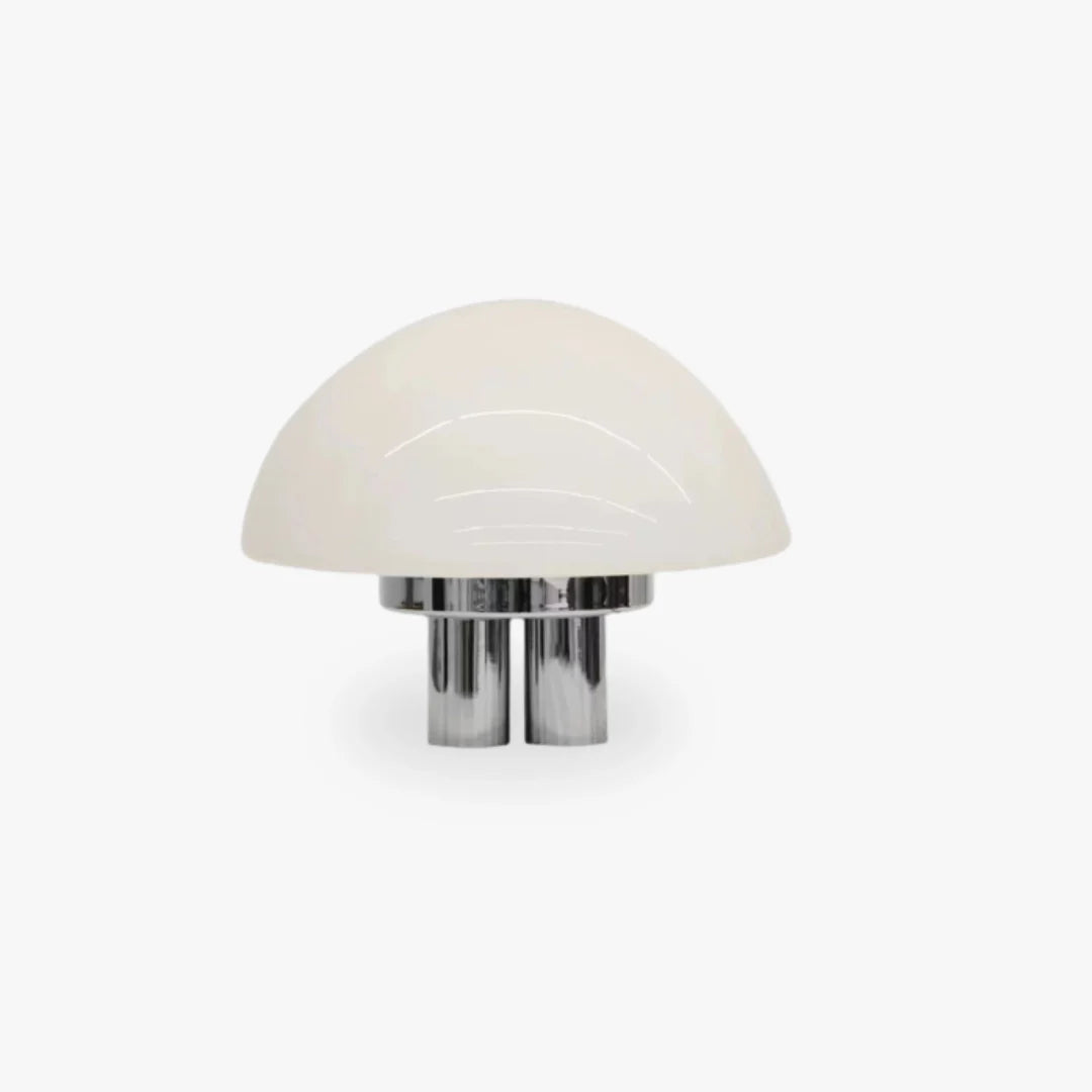 White glass dome and metallic base define this Bauhaus lamp, perfect for minimalist interiors.
