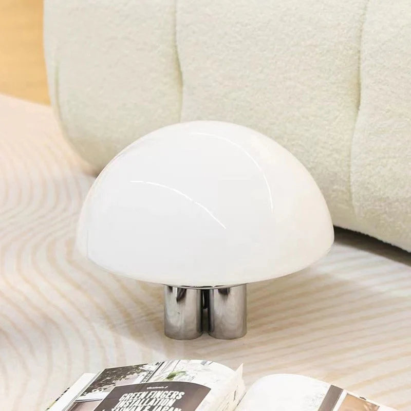 this Bauhaus lamp balances function and artistic style next to the sofa