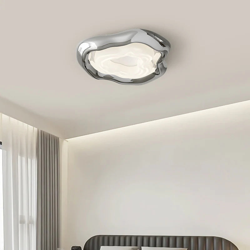 Artful ceiling light fits modern aesthetics, delivering both style and illumination.