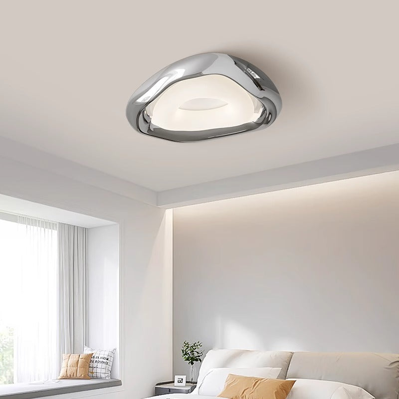 Stylish ceiling piece blends form and function, elevating decor effortlessly.