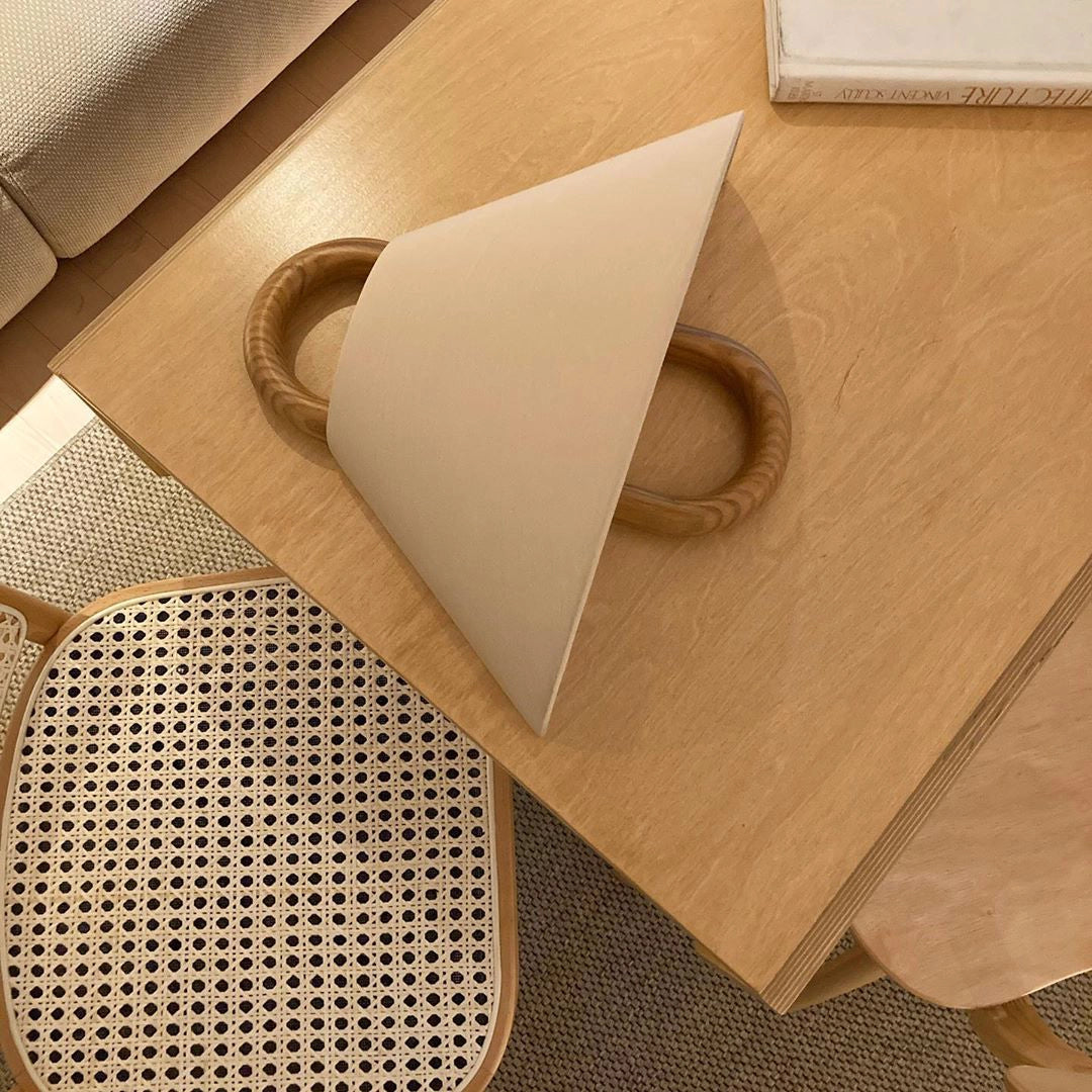 Beech_Solid_Wood_Wall_Lamp_on_the_wood_desk