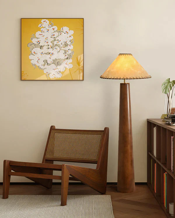 Showcasing Japanese charm, this lamp features a warm wooden body and fabric shade