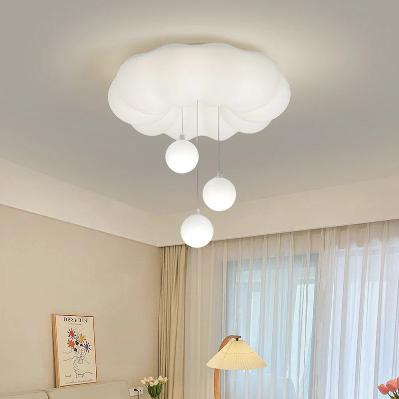 Cloud Bubble Ceiling Lamp emitting white light in a cream-style living room