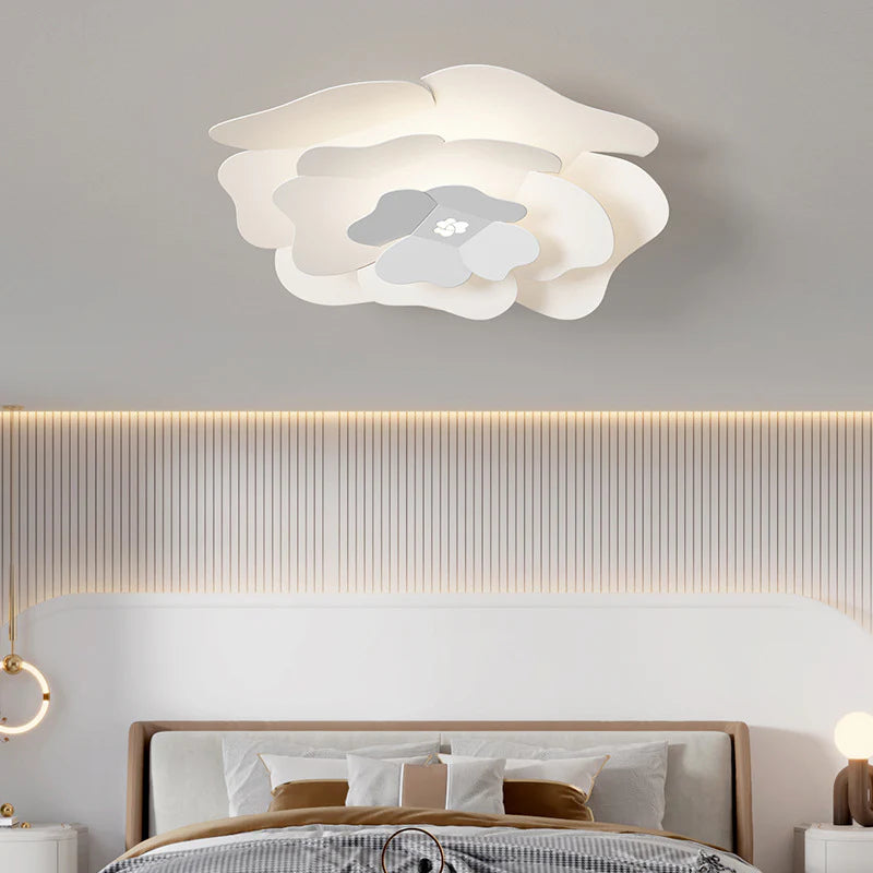 A petal-shaped three-tier ceiling lamp illuminates a modern bedroom