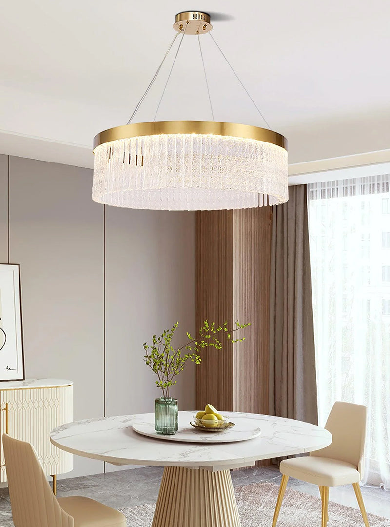 Elegant Crystal Chandelier made of clear crystal pieces hangs in the fresh-style living room