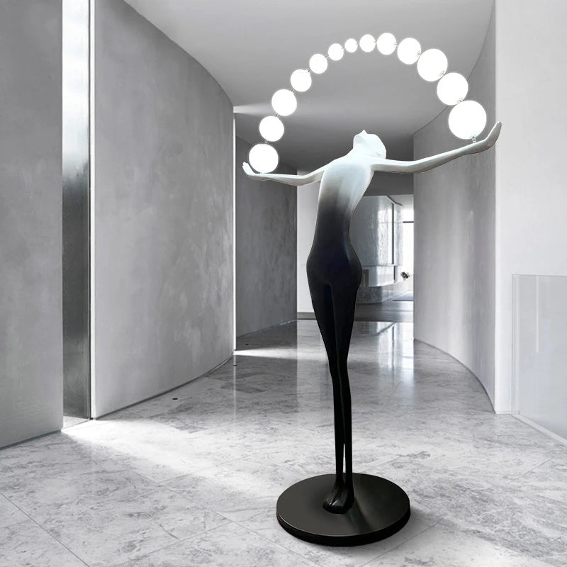 The elegant dancing floor lamp in the aisle