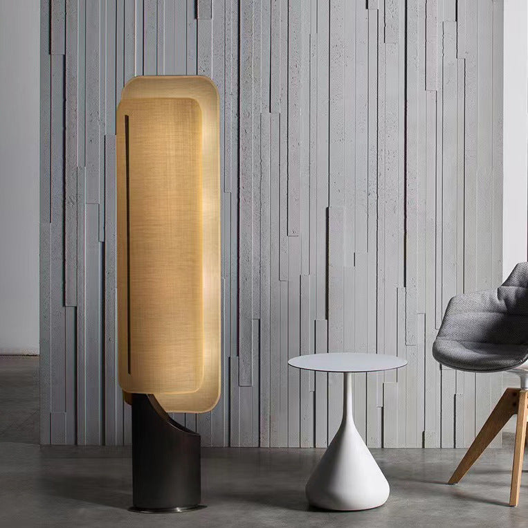 Creatively designed Ibiza Floor Lamp: Blends metal components with a cloth lampshade, balancing functionality and decorative appeal.