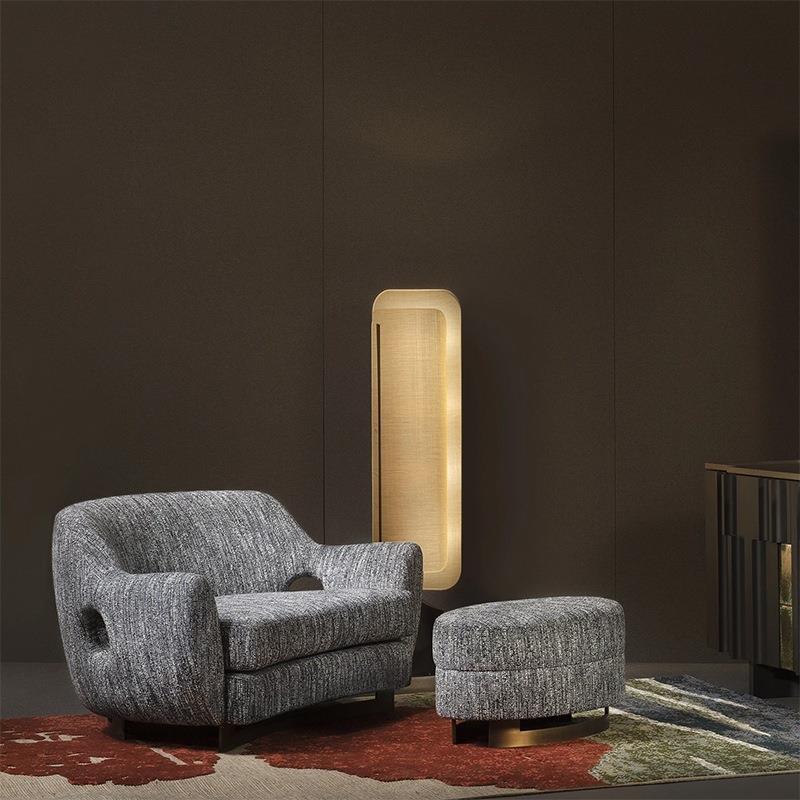 Ibiza Floor Lamp: Boasts a sturdy metal base and a cloth lampshade, delivering soft, comfortable lighting.