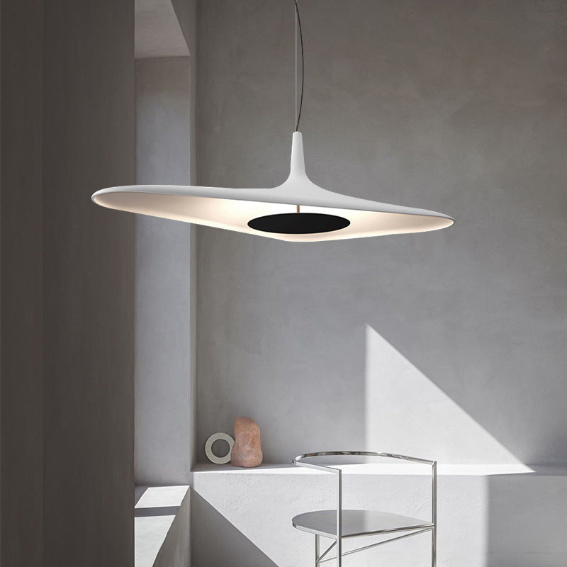 Sleek Resin Pendant Light with Irregular Form: Offers minimalist elegance, suitable for modern kitchens or dining areas.