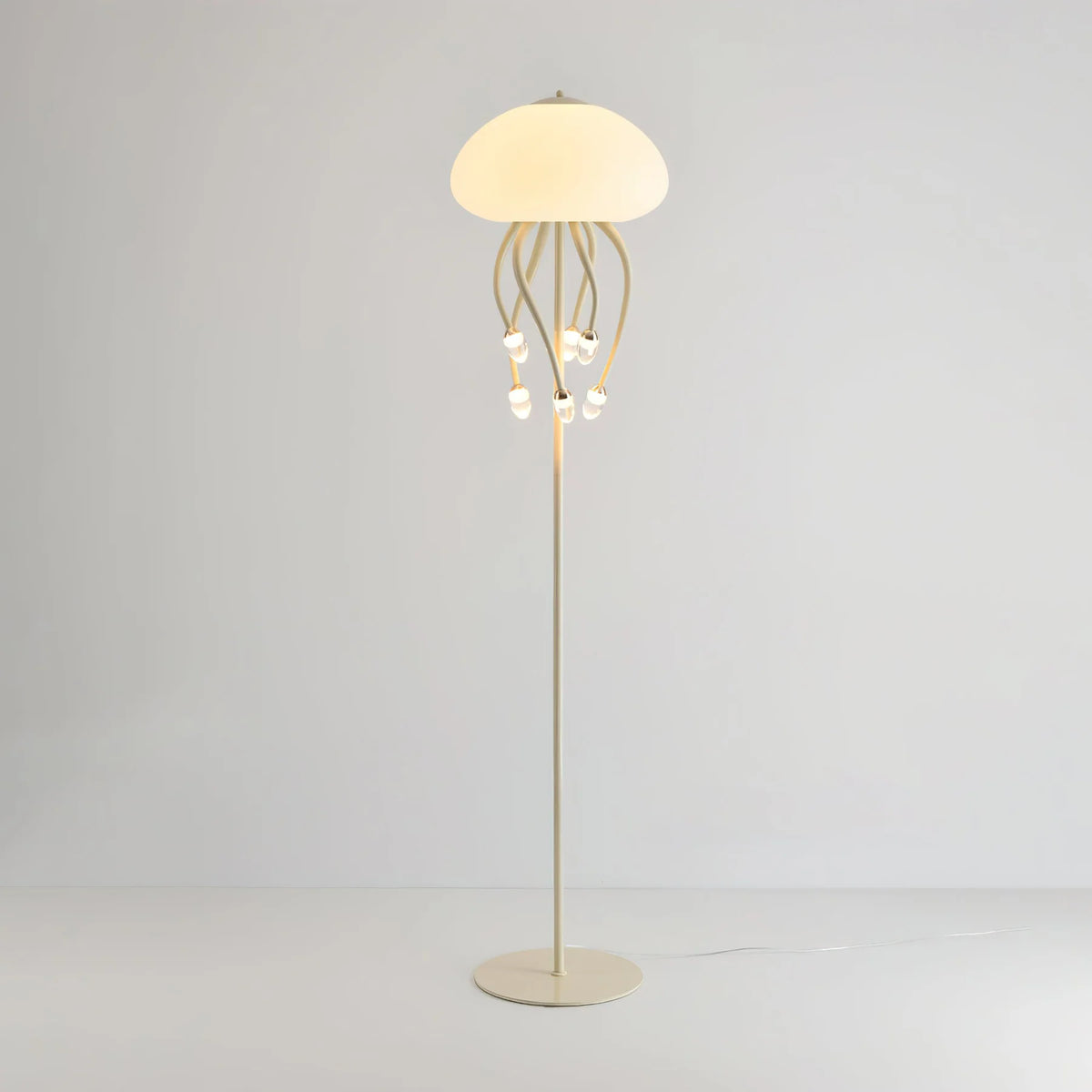 Crafted with metal and acrylic, the lamp’s unique design fits seamlessly into contemporary spaces.