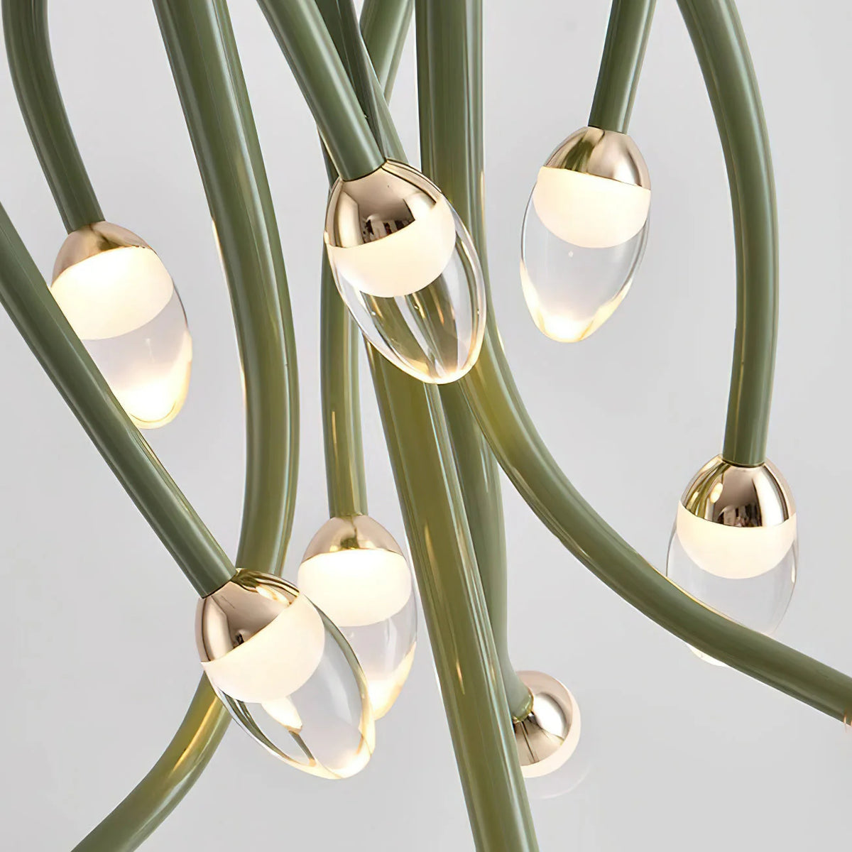 Whimsical lighting piece, inspired by jellyfish, uses metal and acrylic to create oceanic charm.