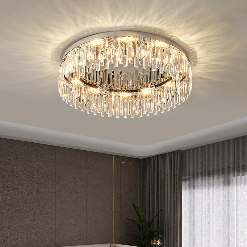 The round crystal ceiling lamp in the bedroom sparkles under the light.
