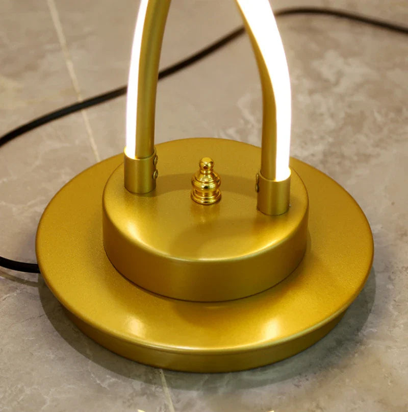 Textured gold electroplated base with weighted stability.