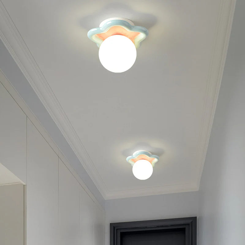 Crafted for modern interiors, the ceiling light’s star design and soft hues suit playful, cozy kid spaces.