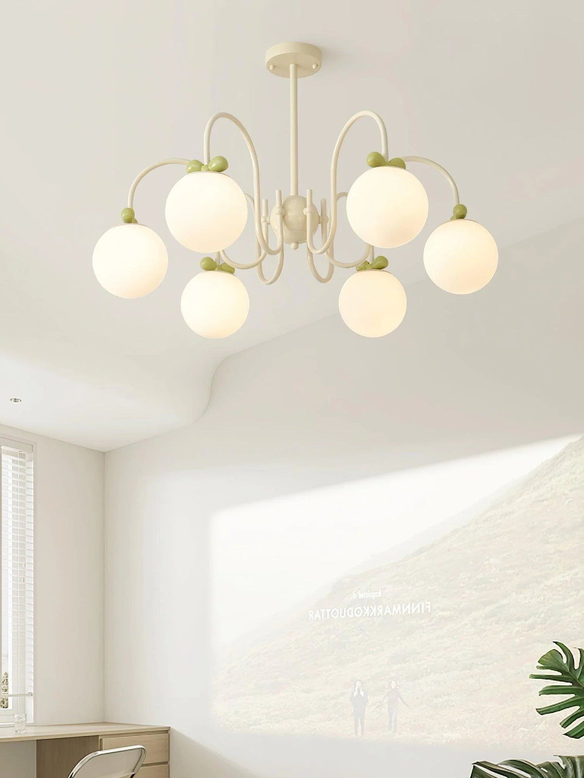 Modern chandelier: creamy white orbs paired with green cherries for stylish spaces.