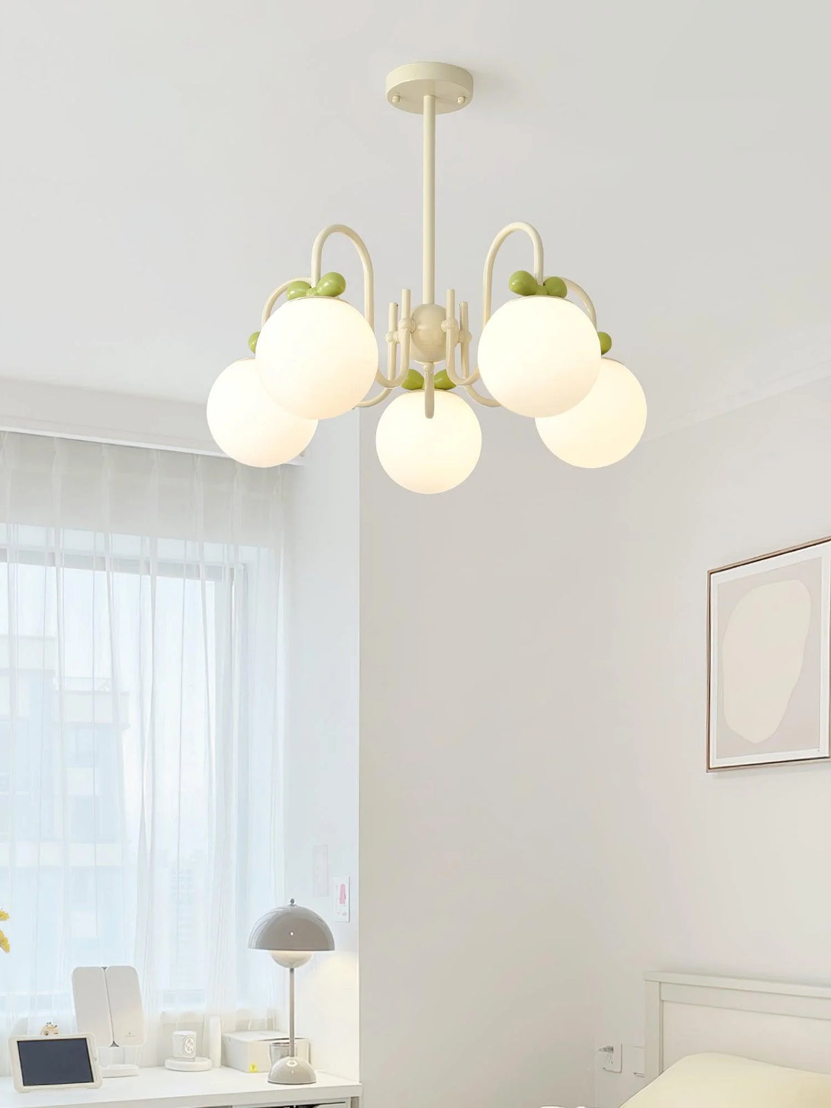 Elegant piece: white spherical lights + cherry motifs bring soft, modern allure.