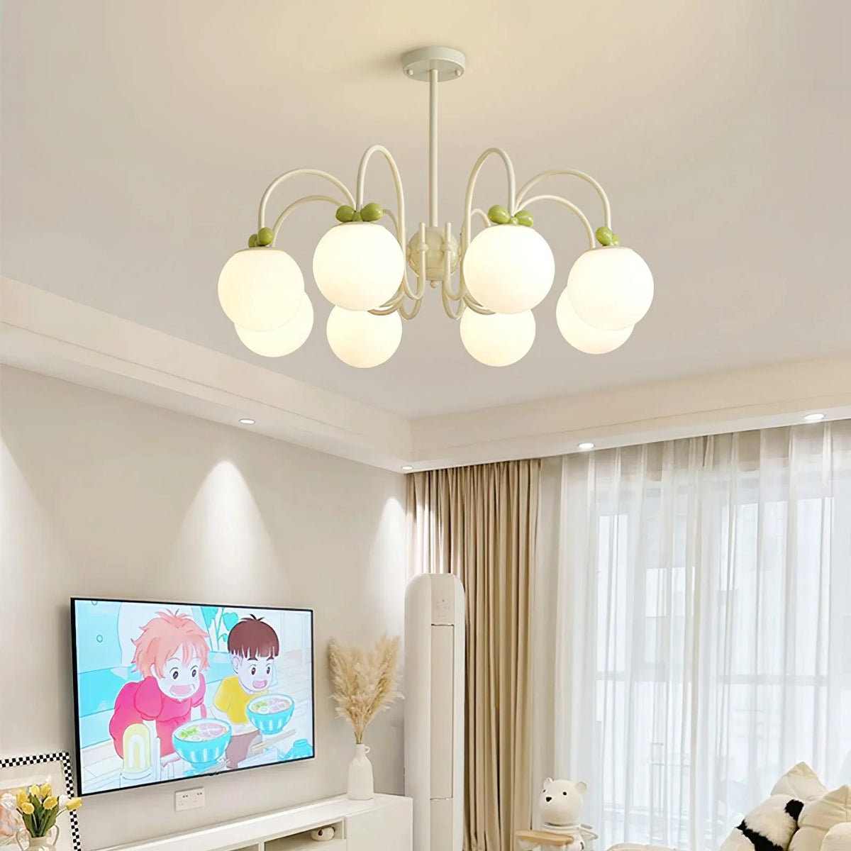 Charming chandelier: combines creamy white lights and cherry details for modern flair.