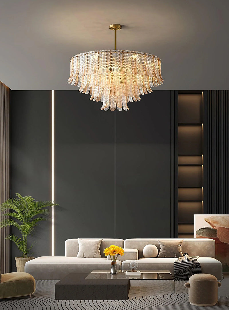 A chandelier made of glass feathers lights up the home at night