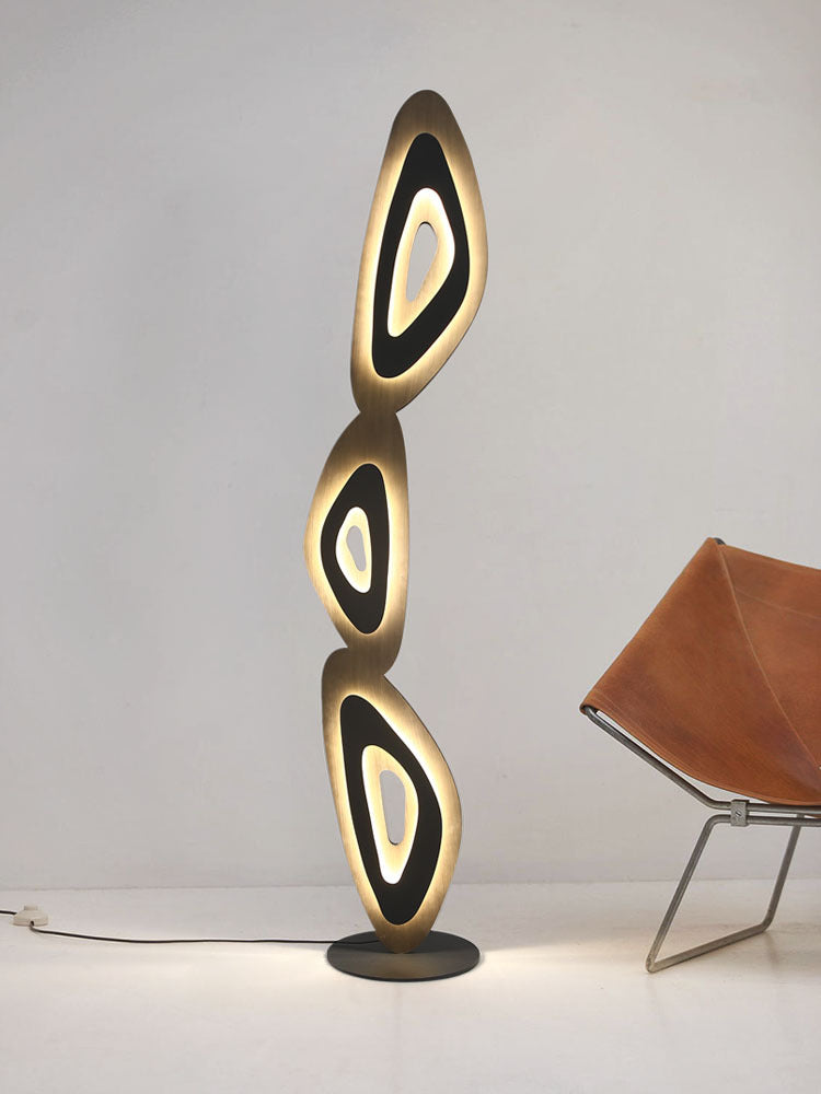 Modern design floor lamp offers both light and decorative appeal.