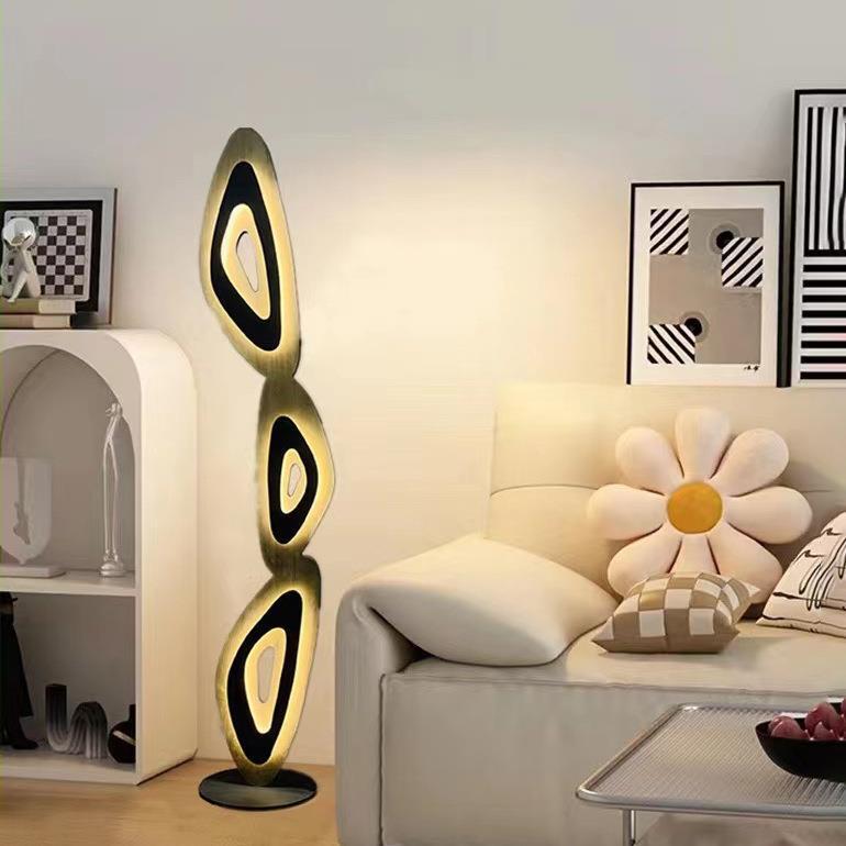 Trendy floor lamp: artistic silhouette meets functional lighting.