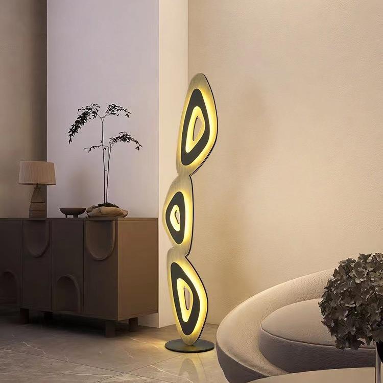 Contemporary floor lamp: sculptural piece brightening spaces gracefully.