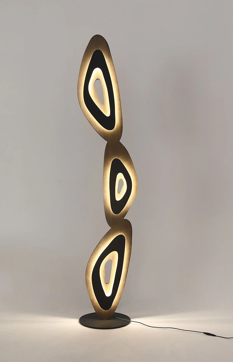 Chic lamp blends form and function, perfect for modern interiors.