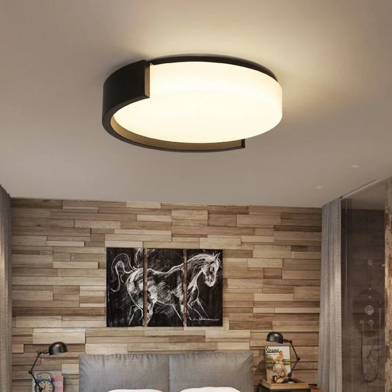 A chic round ceiling light, perfect for adding a touch of sophistication—its soft glow fits living areas or bedrooms seamlessly.