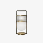 Sleek hand table lamp: Nordic style, glass structure, ideal for decor and lighting.