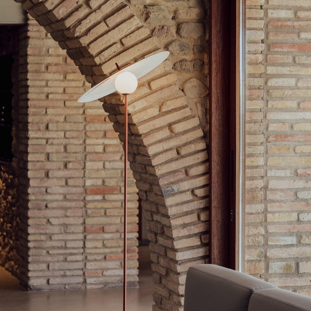 A floor lamp combining function and aesthetics, its dark brown tone and simple design fit various decor styles easily.