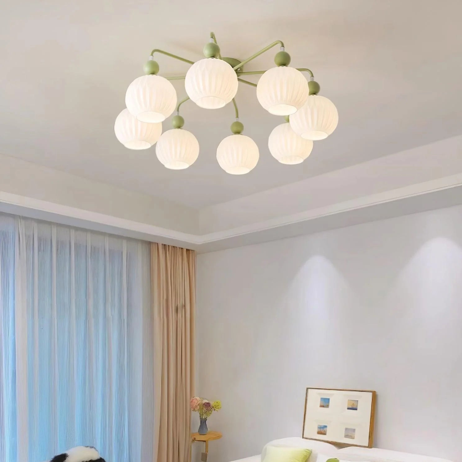 The Renee Ceiling Light hangs in the cream-style living room.