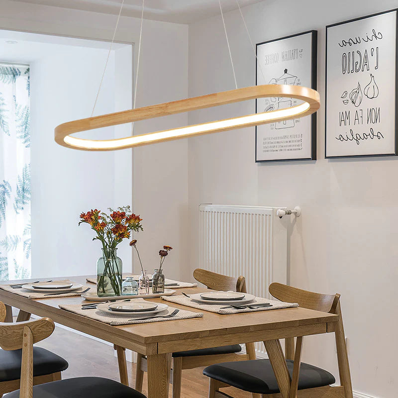 A modern lighting fixture, the Wood Oval Led Pendant Light, crafted from Rubber Wood and Acrylic, offering a sleek and elegant hanging design.