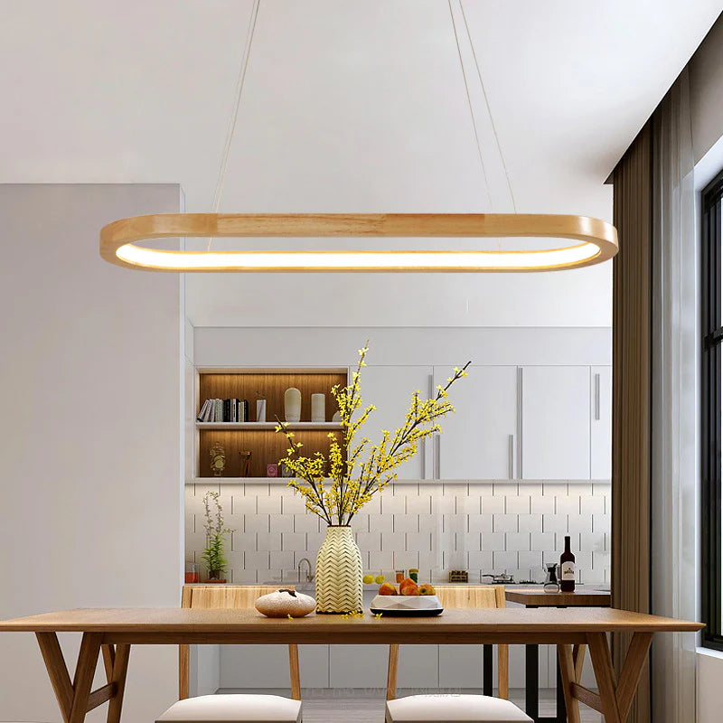 This Wood Oval Led Pendant Light combines Rubber Wood’s warmth with Acrylic’s clarity, creating a stylish addition to contemporary interiors.
