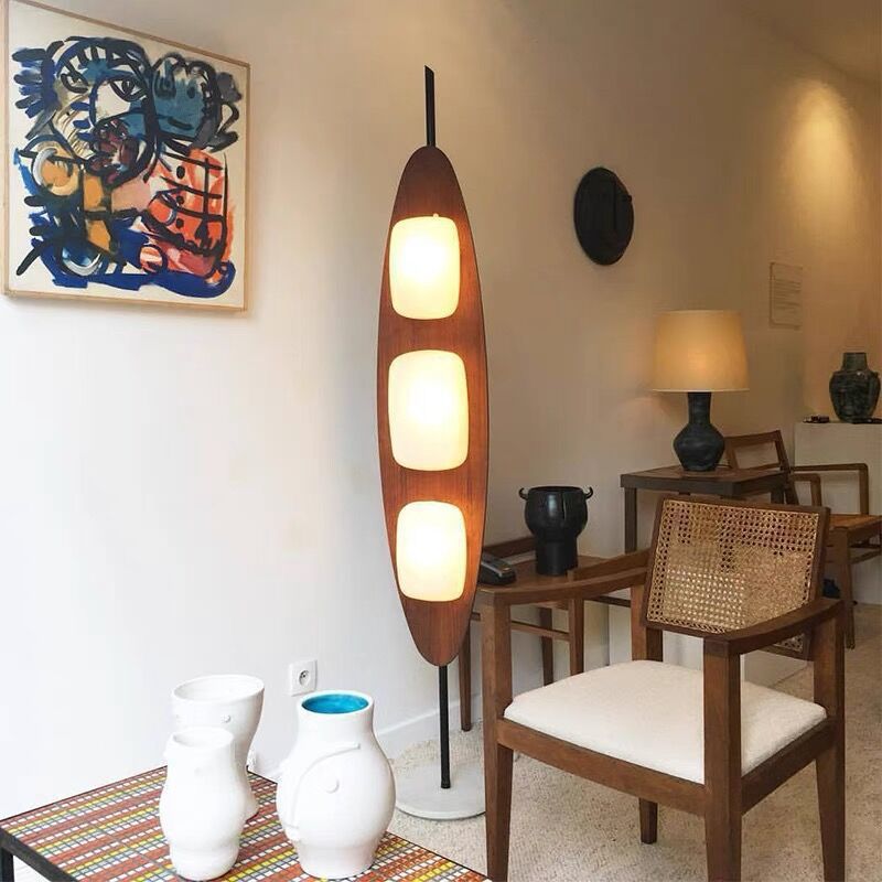 Eye-catching surfboard design floor lamp for contemporary rooms.