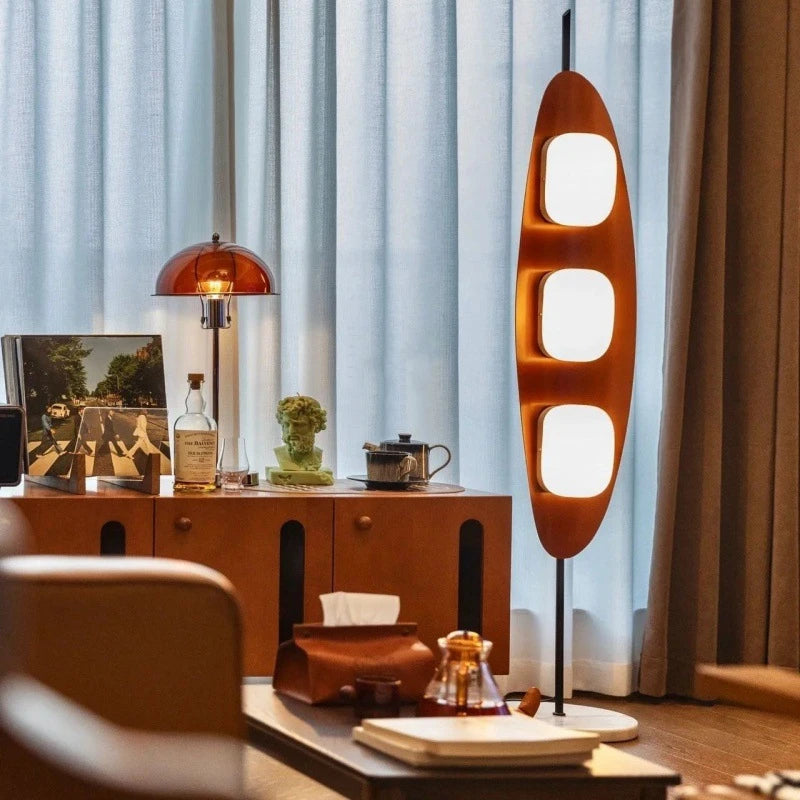 Chic surfboard floor lamp enhances living areas with cool vibe.
