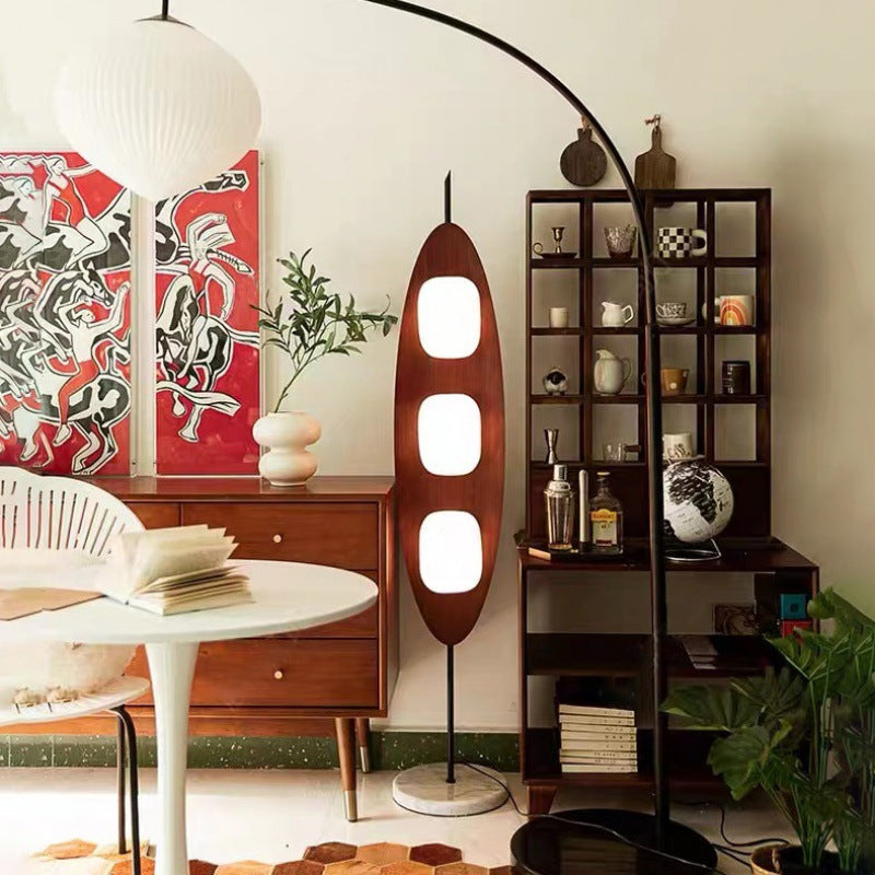 Sleek surfboard-shaped floor lamp, perfect for modern interiors.