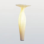 Front view of Vase Floor Lamp with gray background.