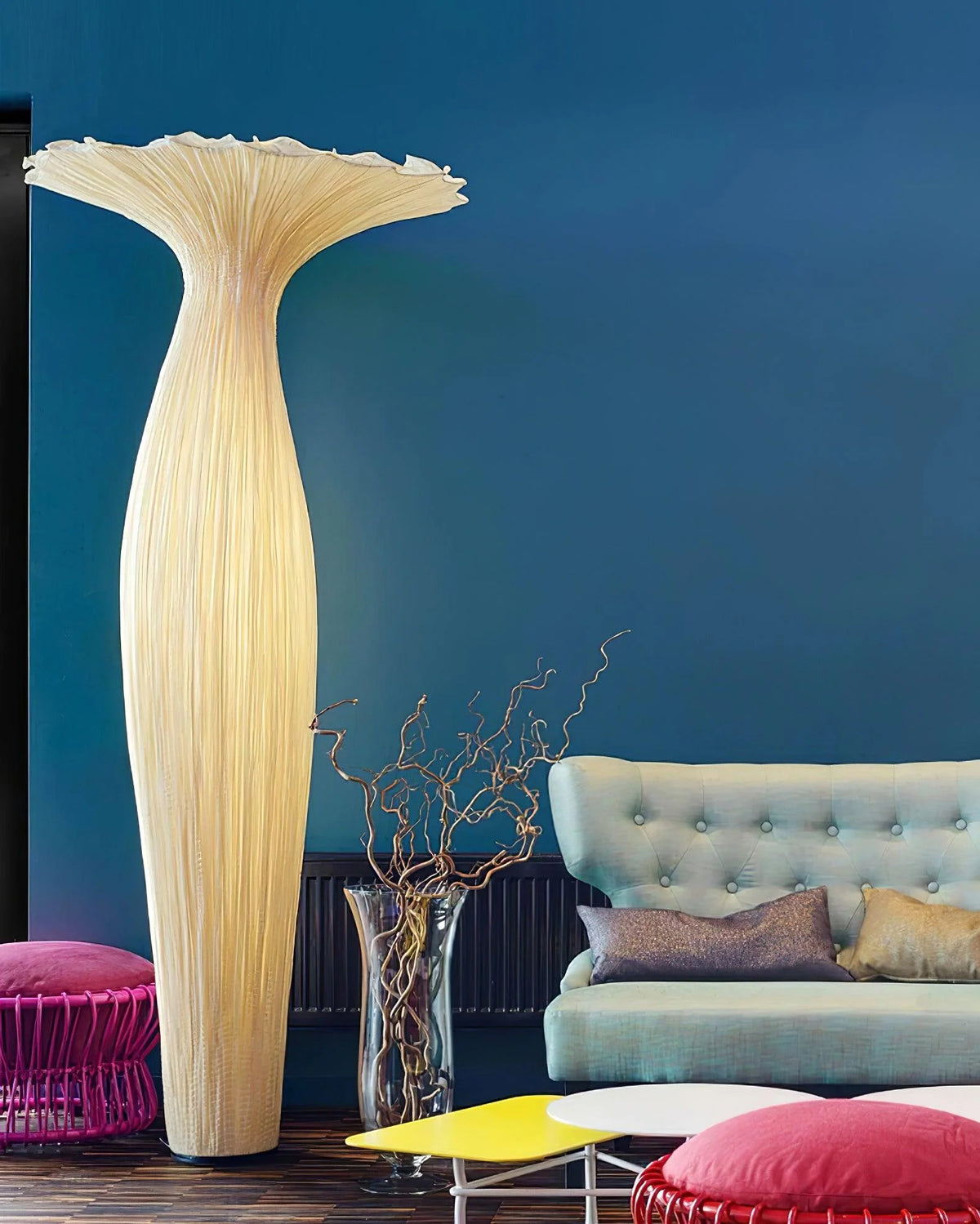 The Vase Floor Lamp is placed in a colorful living room, forming a plant world with other furniture.