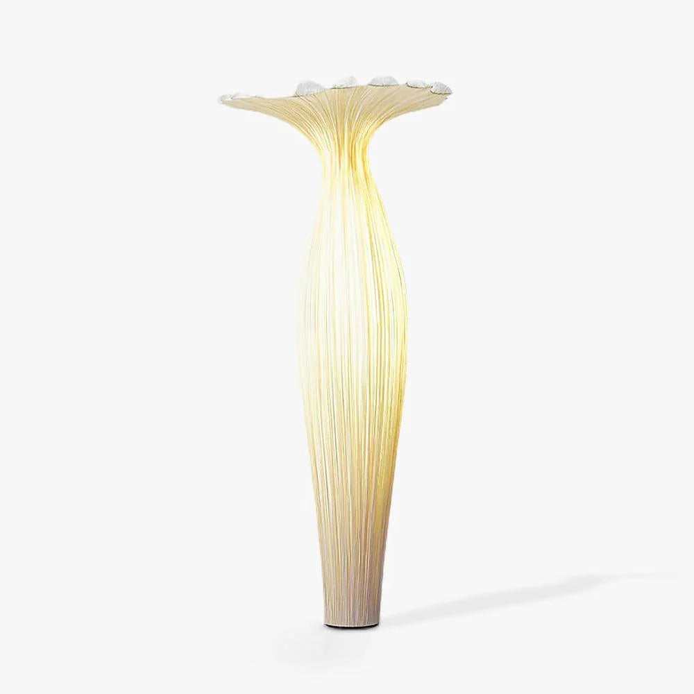 The vase Floor Lamp made of fabric has a slender shadow on the gray and white background.