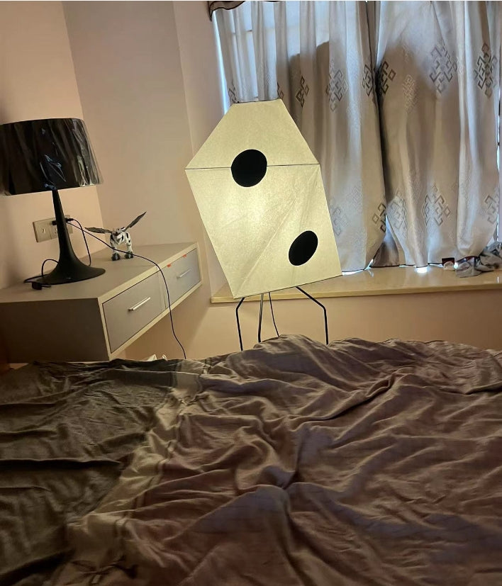 The Vitra Akari UF3-Q Floor Lamp showcases Japanese minimalism