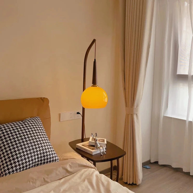 Modern study room piece: shelf floor lamp with grapefruit-style glass cover and sturdy base