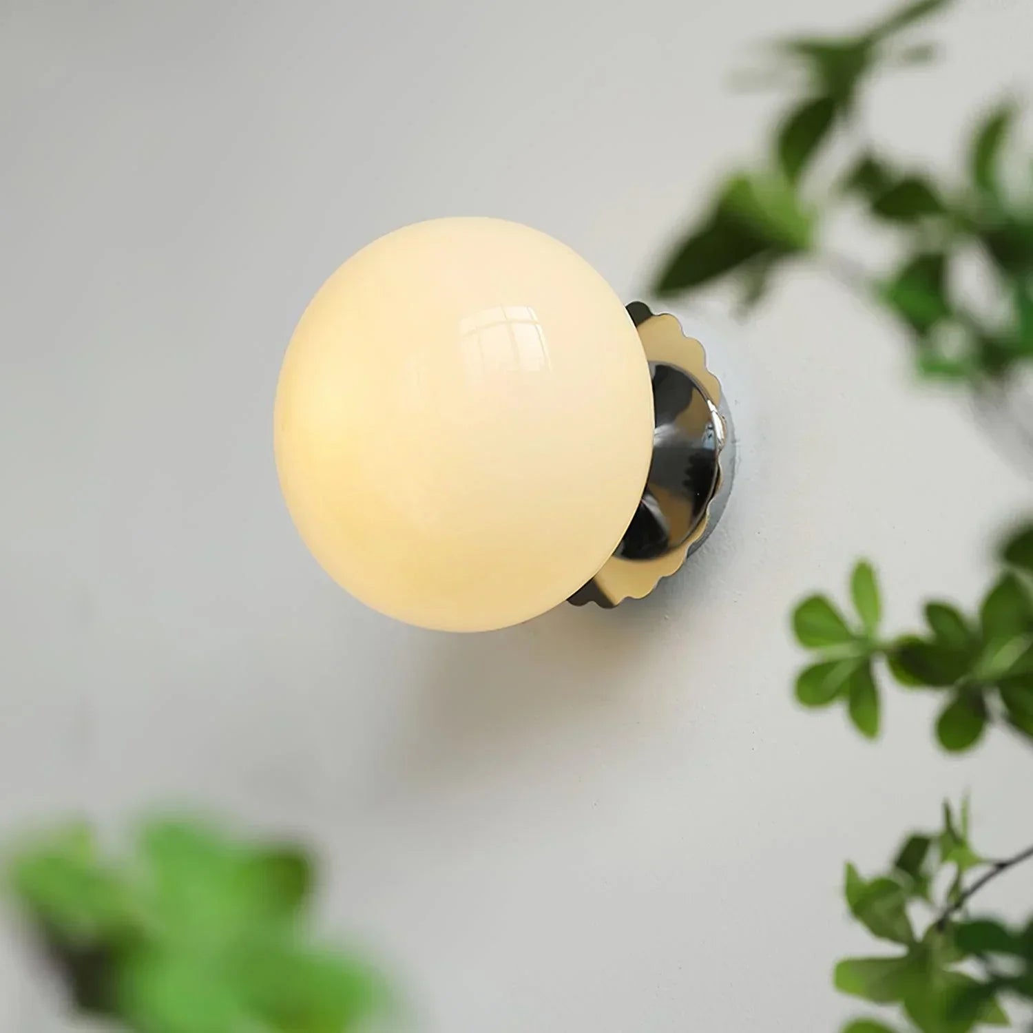 Niche lighting fixtures made with water transfer wood grain, hand-blown glass, rattan and linen fabric