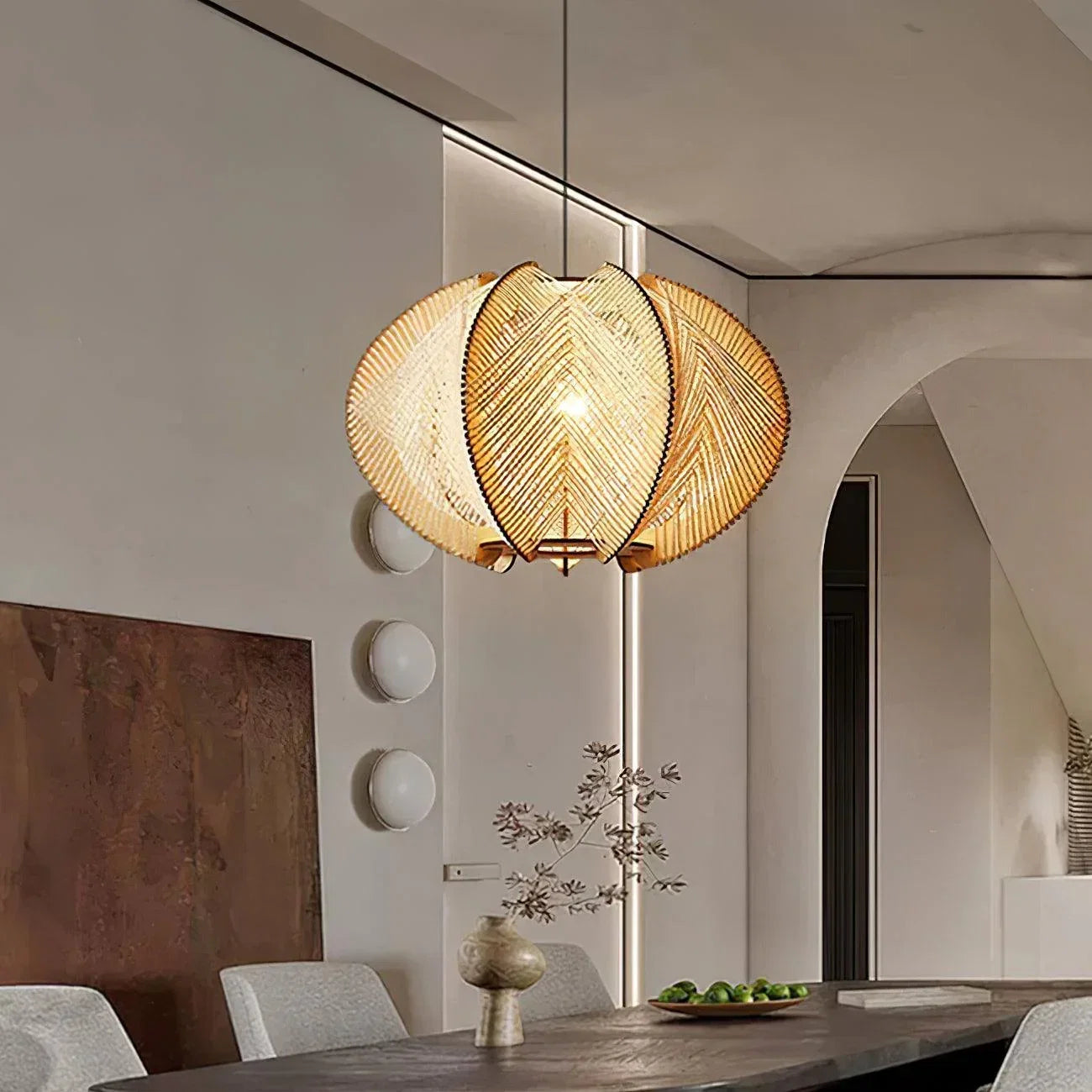 Natural pendant lights in a warm modern dining room interior