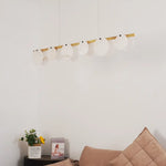 Unlit alabaster restaurant chandelier serves as elegant art ornament inside modern living room