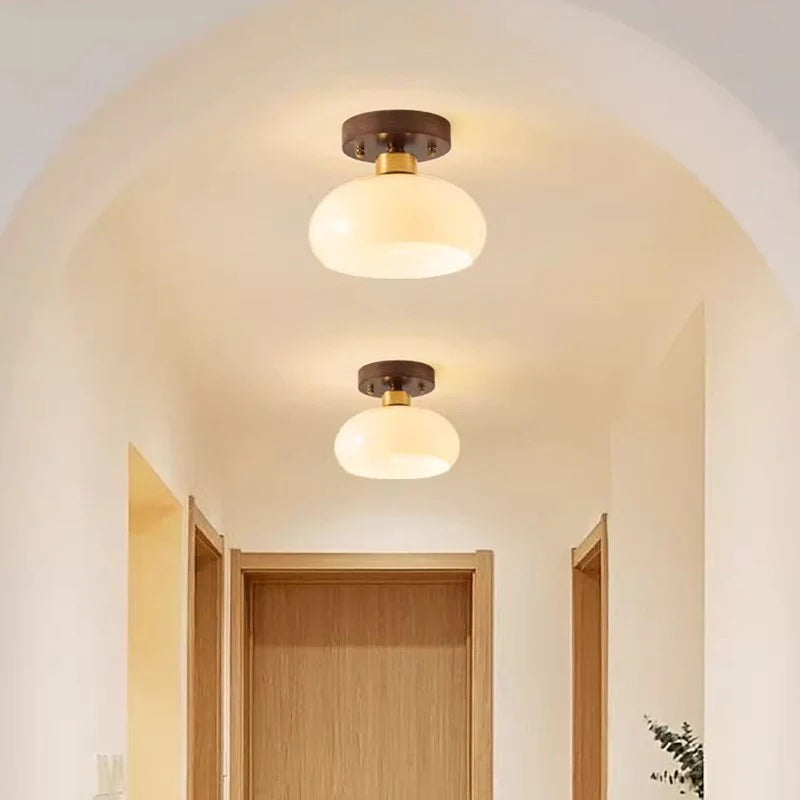 Elegant ceiling light blends timeless design with warm illumination for any room.