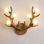 Non-toxic resin antler lighting fixture in a nursery, adding whimsical woodland vibes.