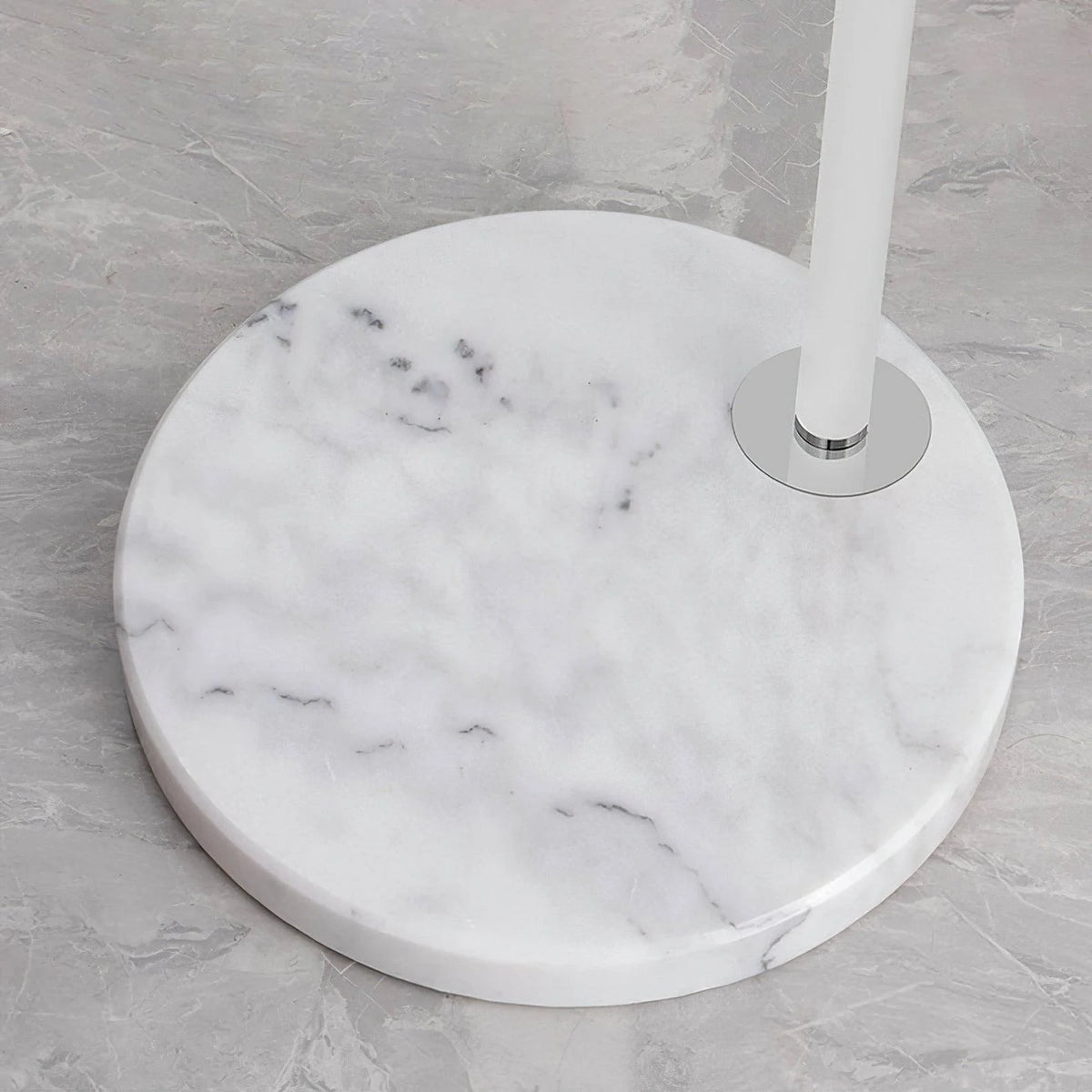 the marble base of the Arched Pine Cone Floor Lamp