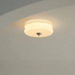 Art_Deco_Cream_Ceiling_Light illuminate a warm light